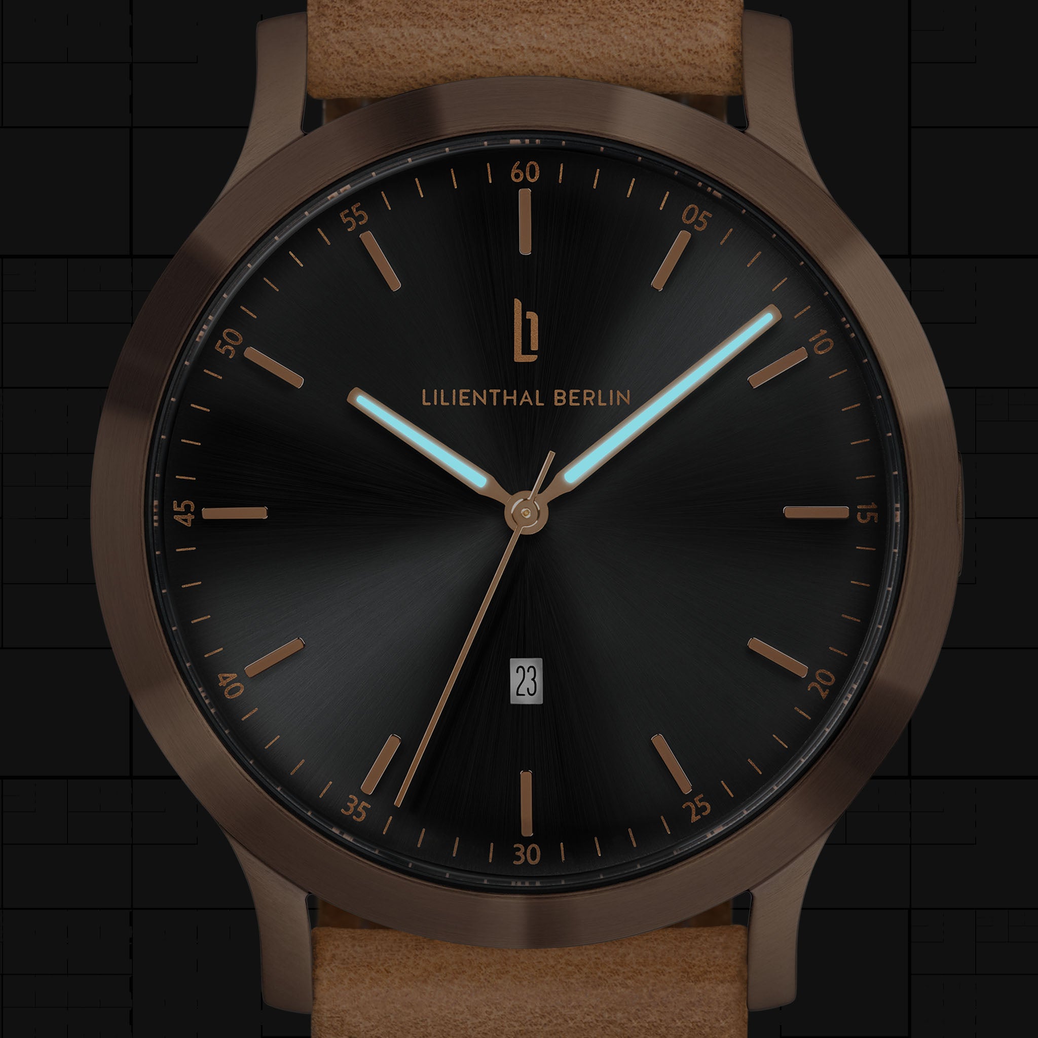 Elegant black dial wristwatch with gold case, date window, and light brown leather strap