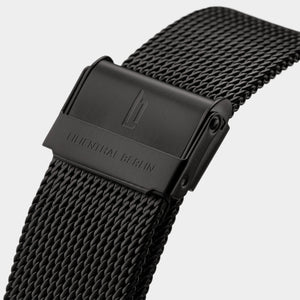 Black mesh stainless steel watch strap with engraved clasp closeup